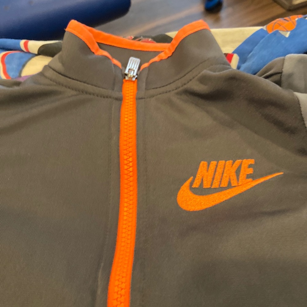 2 kids Nike zip up jackets